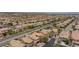 An aerial view of a residential neighborhood showcasing well-maintained homes and mature trees at 11221 Victoria Medici St, Las Vegas, NV 89141
