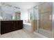 Bathroom featuring dual sinks, vanity, a shower, and a tub at 11221 Victoria Medici St, Las Vegas, NV 89141