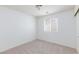 Neutral bedroom featuring carpeted floors and a window at 11221 Victoria Medici St, Las Vegas, NV 89141