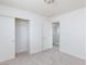 Bedroom with carpet, closet, and door leading to the hallway at 11221 Victoria Medici St, Las Vegas, NV 89141