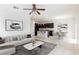 Inviting living room showcasing an open floor plan connected to the modern kitchen at 11221 Victoria Medici St, Las Vegas, NV 89141