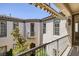 Exterior balcony with an awning over it, and a view of the courtyard at 11503 Glowing Sunset Ln, Las Vegas, NV 89135