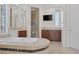 Bright bathroom featuring a soaking tub, double vanity, and a separate walk-in shower at 11503 Glowing Sunset Ln, Las Vegas, NV 89135