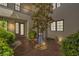 Picturesque courtyard featuring mature landscaping and a peaceful ambiance at 11503 Glowing Sunset Ln, Las Vegas, NV 89135
