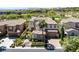 Elegant two-story home featuring a tiled roof, lush landscaping, and an inviting entrance at 11503 Glowing Sunset Ln, Las Vegas, NV 89135