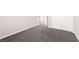Neutral bedroom features gray carpet, closet, and leads to the bathroom at 11847 Corenzio Ave, Las Vegas, NV 89138