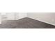 Neutral bedroom features gray carpet, closet, and leads to another bedroom at 11847 Corenzio Ave, Las Vegas, NV 89138