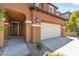 Charming home exterior with a two-car garage, and inviting entrance, showing great curb appeal at 11847 Corenzio Ave, Las Vegas, NV 89138