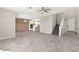 Spacious living area with stairway featuring sleek tile floors at 11847 Corenzio Ave, Las Vegas, NV 89138