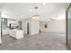 Spacious open floorplan seamlessly connects the kitchen, dining, and living areas at 11847 Corenzio Ave, Las Vegas, NV 89138