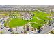 Aerial view of the community park featuring a playground, walking paths, and green spaces at 11847 Corenzio Ave, Las Vegas, NV 89138