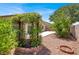 Backyard view with a pergola, hardscape, and desert landscaping at 1212 E Rome Blvd, North Las Vegas, NV 89086
