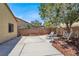 Backyard features hardscape, rock mulch, and drought-tolerant landscaping at 1212 E Rome Blvd, North Las Vegas, NV 89086
