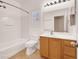 This is a standard bathroom with a tub/shower combo and a single sink vanity at 1212 E Rome Blvd, North Las Vegas, NV 89086