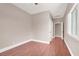 Cozy bedroom with hardwood floors, window with shutters and neutral paint at 1212 E Rome Blvd, North Las Vegas, NV 89086