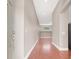 Spacious hallway with hardwood floors leading to a brightly lit area at 1212 E Rome Blvd, North Las Vegas, NV 89086