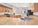 Functional kitchen featuring granite countertops, an island, and stainless steel appliances at 1212 E Rome Blvd, North Las Vegas, NV 89086