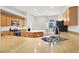 This kitchen boasts granite countertops and a central island at 1212 E Rome Blvd, North Las Vegas, NV 89086