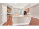 Inviting kitchen with wood cabinets, granite counters, and stainless steel appliances at 1212 E Rome Blvd, North Las Vegas, NV 89086