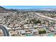 Breathtaking aerial view displays a picturesque suburban area with attractive homes, green landscaping, and nearby highway access at 130 Park Ridge Ln, Henderson, NV 89002