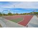 Community basketball court with multiple hoops and ample playing space, great for recreation at 130 Park Ridge Ln, Henderson, NV 89002