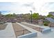Community bocce ball court near walking path and landscaping at 130 Park Ridge Ln, Henderson, NV 89002