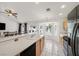 Bright kitchen featuring stainless steel appliances and adjacent breakfast nook at 130 Park Ridge Ln, Henderson, NV 89002