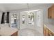 Sunlit kitchen nook with backyard views through bay window at 130 Park Ridge Ln, Henderson, NV 89002