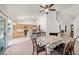 Bright kitchen and dining area with stainless steel appliances, and fireplace at 130 Park Ridge Ln, Henderson, NV 89002
