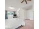 Main bedroom featuring vaulted ceilings, and large window at 130 Park Ridge Ln, Henderson, NV 89002