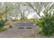 Paradise Pointe Park sign surrounded by lush greenery and natural landscaping at 130 Park Ridge Ln, Henderson, NV 89002