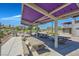 Covered picnic tables and benches, ideal for outdoor dining and gatherings at 130 Park Ridge Ln, Henderson, NV 89002