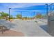 Community skate park featuring ramps, rails, and smooth concrete surfaces at 130 Park Ridge Ln, Henderson, NV 89002