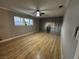 Inviting bedroom with new wood floors, neutral paint, and natural lighting at 150 Greenbriar Townhouse Way, Las Vegas, NV 89121