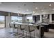 Spacious kitchen with an island and seating, stainless steel appliances, and pendant lighting at 1683 Tangiers Dr, Henderson, NV 89012