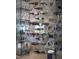Detailed view of the glass wine storage display, showing bottles and glasses at 1683 Tangiers Dr, Henderson, NV 89012