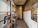 A basement featuring a sink, storage, and a mirror providing a functional space for various activities or hobbies at 1704 S 8Th St, Las Vegas, NV 89104