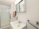 Bathroom with shower stall, updated vanity, and grab bars at 1704 S 8Th St, Las Vegas, NV 89104
