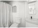 Functional bathroom with a toilet, sink, and shower, providing essential amenities in a compact space at 1704 S 8Th St, Las Vegas, NV 89104
