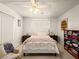 Bright bedroom with white walls, comfortable bed, and a storage unit with linens at 1704 S 8Th St, Las Vegas, NV 89104