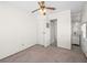 Neutral bedroom with a ceiling fan, closet, and attached bathroom at 1704 S 8Th St, Las Vegas, NV 89104