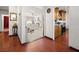Inviting foyer showcasing hardwood floors and seamless transition to kitchen and living spaces at 1704 S 8Th St, Las Vegas, NV 89104
