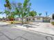 Charming single-story home featuring stucco walls, mature trees and gated access at 1704 S 8Th St, Las Vegas, NV 89104