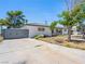 Charming single-story home featuring stucco walls, mature trees and gated access at 1704 S 8Th St, Las Vegas, NV 89104
