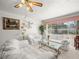 Bright living room with white furniture, and large window at 1704 S 8Th St, Las Vegas, NV 89104