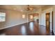 Spacious living room features hardwood floors and an open floor plan with fireplace at 1740 Flores Ln, Henderson, NV 89012