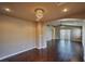 Living room boasts hardwood floors and open floor plan with dining area at 1740 Flores Ln, Henderson, NV 89012