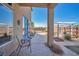 Covered patio area with desert landscaping and pergola in backyard at 1740 Flores Ln, Henderson, NV 89012