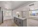 Updated kitchen offers an island with seating and open floor plan at 1804 Pacific St, Las Vegas, NV 89104