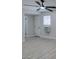 Spacious bedroom with ceiling fan and ample natural light at 1825 Howard Ave, Las Vegas, NV 89104